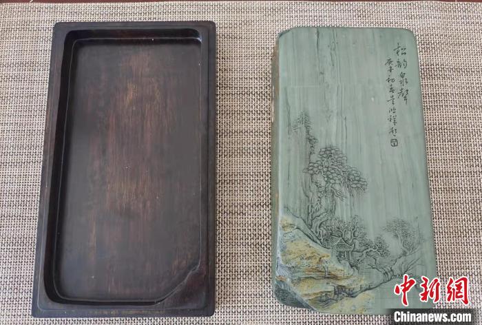 圖為盧保勝為提升洮硯文化內(nèi)涵，制作“一硯一銘、一盒一拓”成品展示?！堟?攝